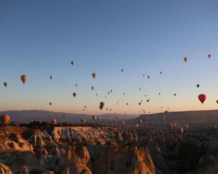Hot air balloons over Cappadocia at sunrise
